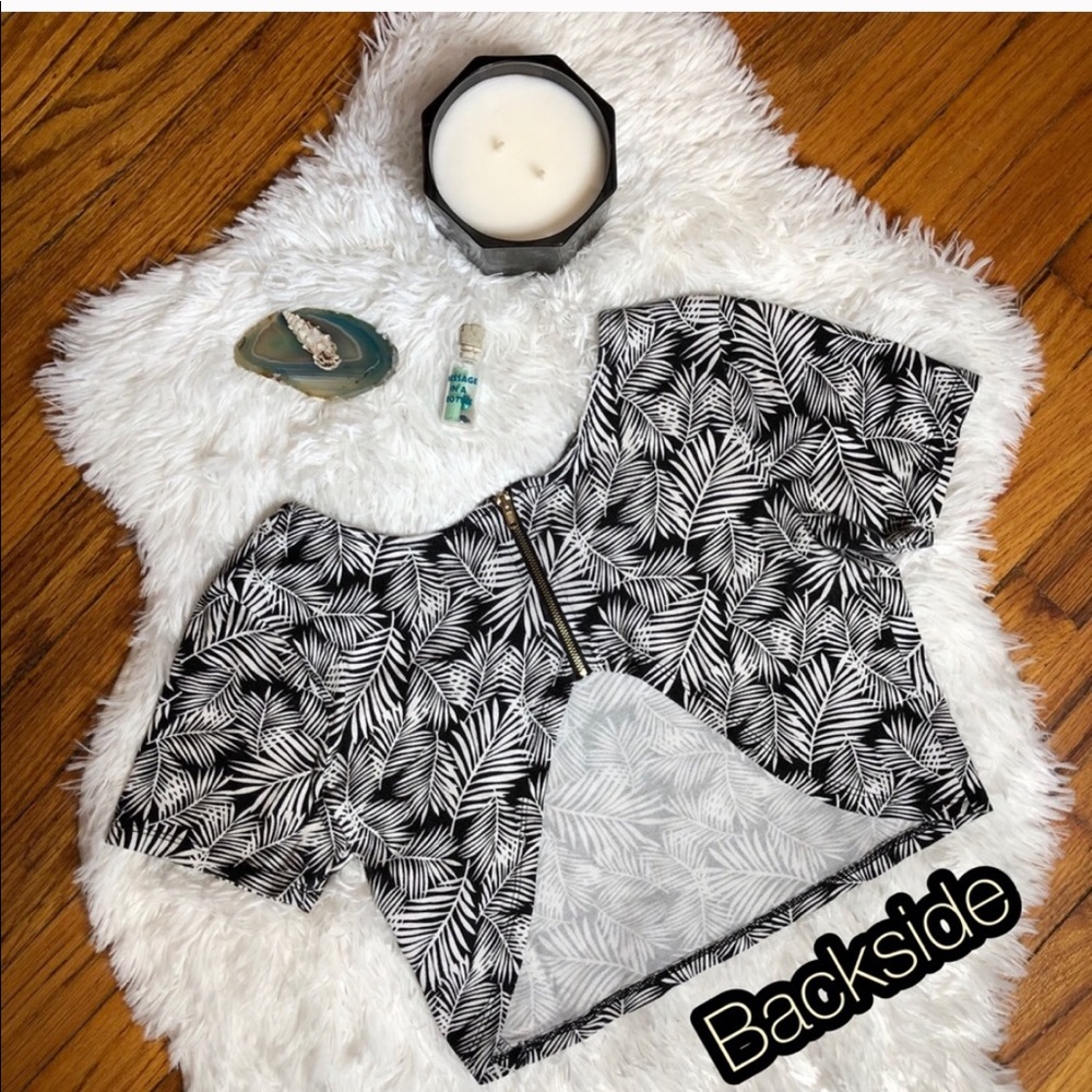 A tropical zip up crop shirt